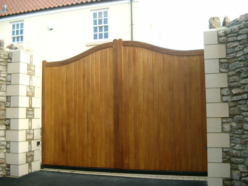 Henley iroko driveway gate and side gate